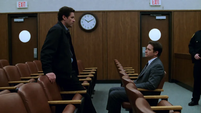 Rddrgn2002, A Man In A Dark Jacket Stands Leaning Against A...