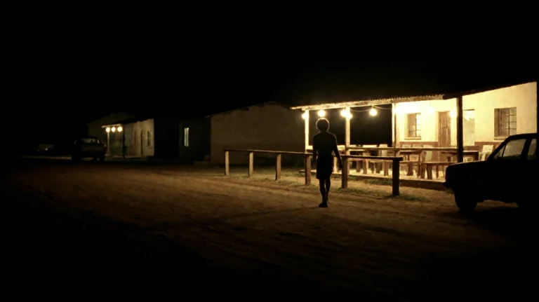 Ctygd2002, A Lone Figure Walks Away From A Brightly Lit Road...