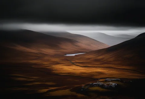 A Highland Moor Under Heavy Grey Clouds, High Angle Shot, Ru... — SDXL AI Prompt: a highland moor under heavy grey clouds, high angle shot, rule of thirds, high c...