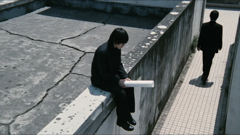Infrnlaffr2002, A Person In Dark Clothing Sits On A Concrete...