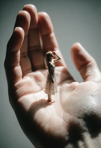 A Close-up Shot Of An Enormous, Photorealistic Human Hand Cu... — Stable Diffusion AI Prompt: A close-up shot of an enormous, photorealistic human hand cupped open against a...