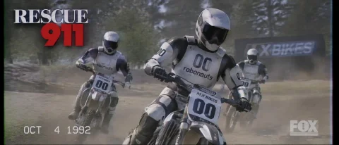 Rescue911 Vhs Still, Mxbikes 00robonauts Riding — Stable Diffusion AI Prompt: rescue911 VHS still, MXbikes 00robonauts riding