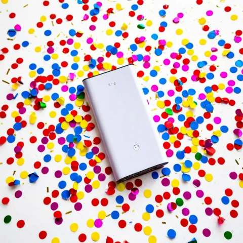 Loratech2confettipopv10.80, Techconfetti, A Portable Power B... — SDXL AI Prompt: , techconfetti, a portable power bank surrounded by colorful scattered paper con...