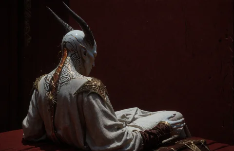 A Pale-skinned Figure Sits In The Lower Portion Of The Frame... — Stable Diffusion AI Prompt: A pale-skinned figure sits in the lower portion of the frame/ back fully turned/...