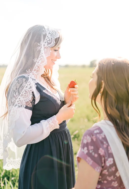 She Offers A Strawberry To Her Companion, A Lace-edged Veil...