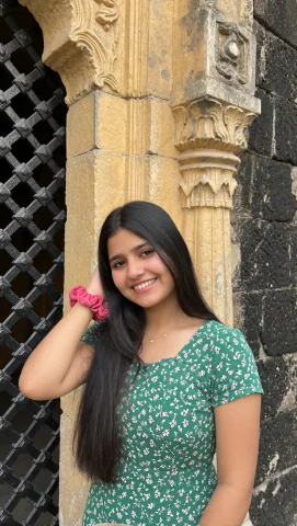 This Photograph, Taken At Eye Level, Captures A Young South... — Stable Diffusion AI Prompt: This photograph, taken at eye level, captures a young South Asian woman with lon...