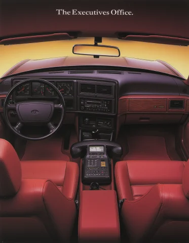 80sairbrush. Magazine Ad. A Car Telephone Seated Inside A Bu... — FLUX AI Prompt: 80sAirbrush. Magazine ad. a car telephone seated inside a burgundy leather luxur...
