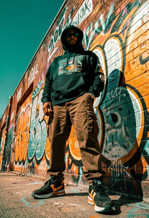 A Bold Streetwear Look Against Graffiti Walls, Photograph, H...