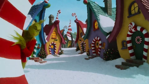 Hwgrnchstl2000, The Grinch Peeking Around A Corner In The Wh... — Stable Diffusion AI Prompt: hwgrnchstl2000, the Grinch peeking around a corner in the whimsical curved stree...