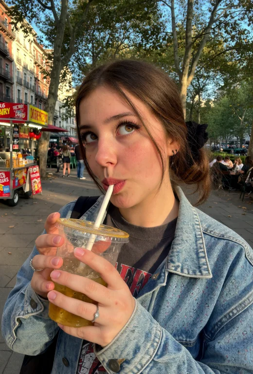 A Curious And Engaged Young Woman Explores The Flavors Of A...