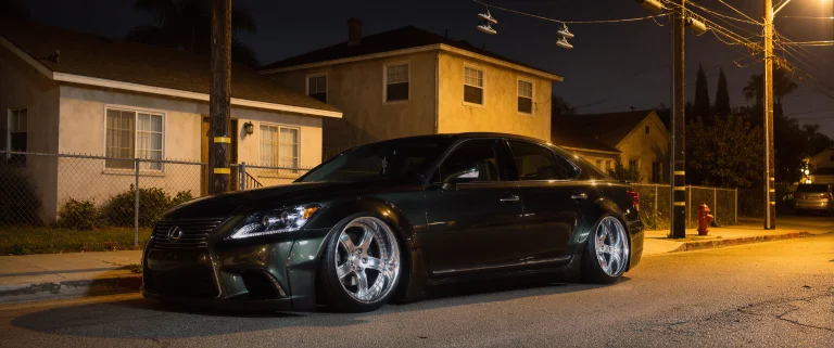 Dynamic 34 Side Angle Wide-shot Of A Parked, Stanced 2011 Le...