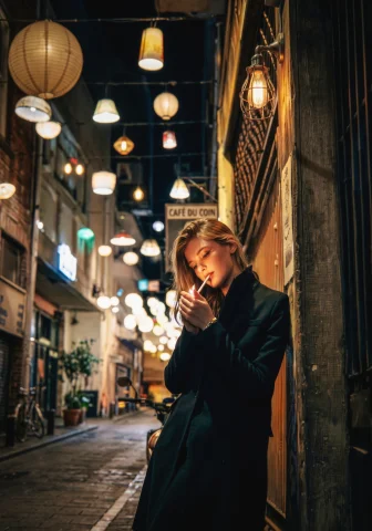 The Image Is A Photograph Taken At Night In A Narrow, Dimly-... — Stable Diffusion AI Prompt: The image is a photograph taken at night in a narrow, dimly-lit alleyway. The al...