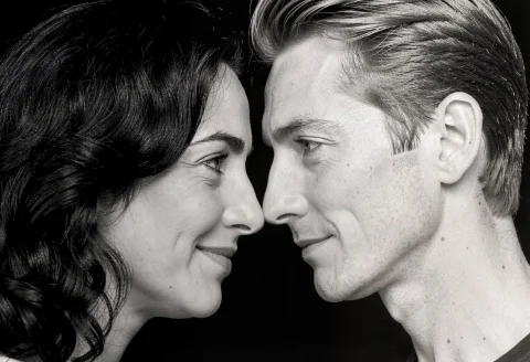 Close Up Black And White Photo Of A Man And A Woman, Their F... — FLUX AI Prompt: Close up black and white photo of a man and a woman, their foreheads touching, l...