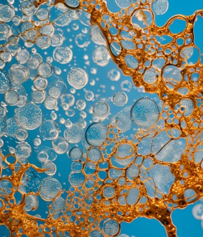 A Close Up Of Water Bubbles On A Blue Background With A Whit... — Stable Diffusion AI Prompt: a close up of water bubbles on a blue background with a white background and a b...