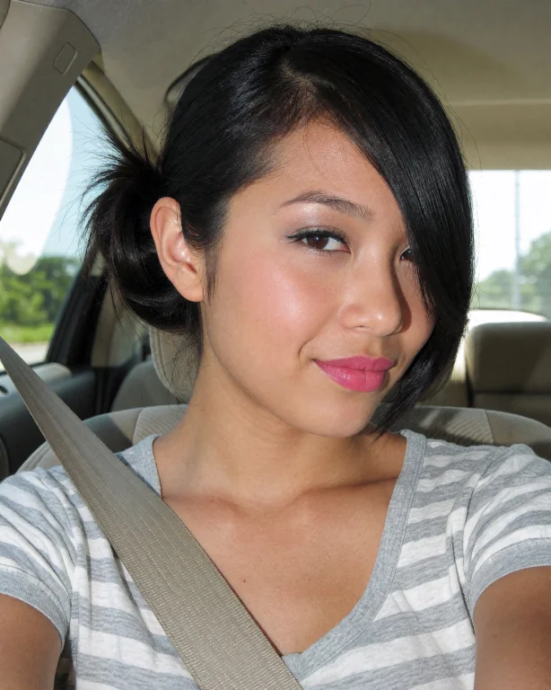 Photograph Of An Asian Young Woman With Light Brown Skin And...