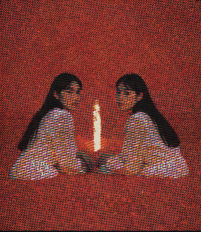 Two Figures Sit Small And Isolated Against A Vast Solid Red...