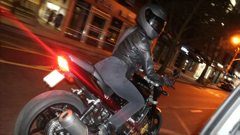 Candidsnap, A Woman In A Jet Black Full-face Helmet With A D...