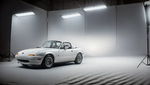 Photo Of White Mazdamiata In A Photography Studio, Hardtop,... — Stable Diffusion AI Prompt: photo of white MazdaMiata in a photography studio, hardtop, high quality photo,...