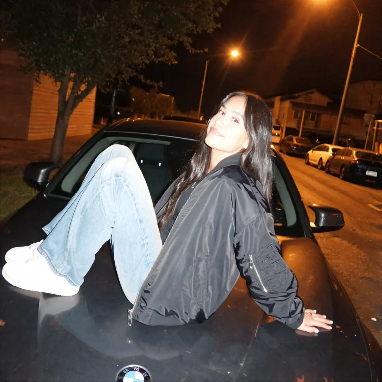 Candidsnap, A Young Woman With Long Dark Hair Sits On The Ho...