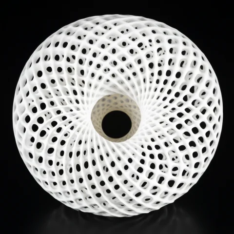 A Gyroid-lattice Sphere Being Compressed Toward A Singularit... — SDXL AI Prompt: A gyroid-lattice sphere being compressed toward a singularity, the struts stretc...