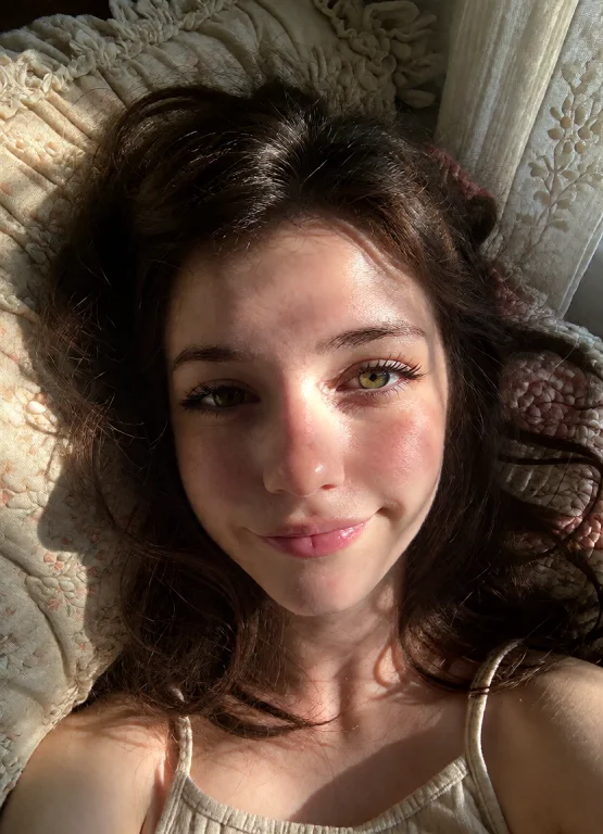 A Candid Smartphone Photo Of A Charming Young Woman With Wav...