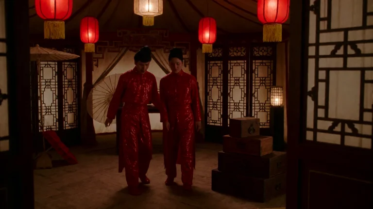 Bgfsh2003, Two Figures In Shimmering Red Costumes Stand Side...