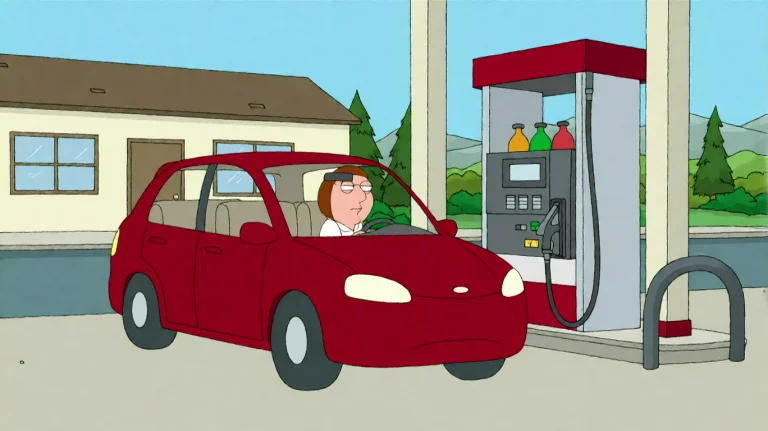 Fmlygyssn05, A Red Car Is Parked At A Gas Station Pump In Fr...
