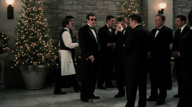 Drdvl2003, A Group Of Formally Dressed Men Stand In A Dimly...