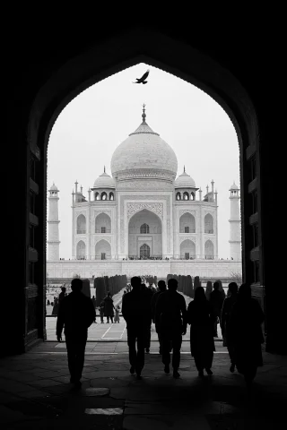 Black And White Photograph Framed By A Dark Silhouetted Ston... — Stable Diffusion AI Prompt: Black and white photograph framed by a dark silhouetted stone archway. Shadowy f...