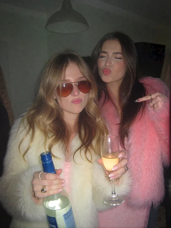 Shot On Nokia With 2000s Aestetics. Two Young Women At A Par...