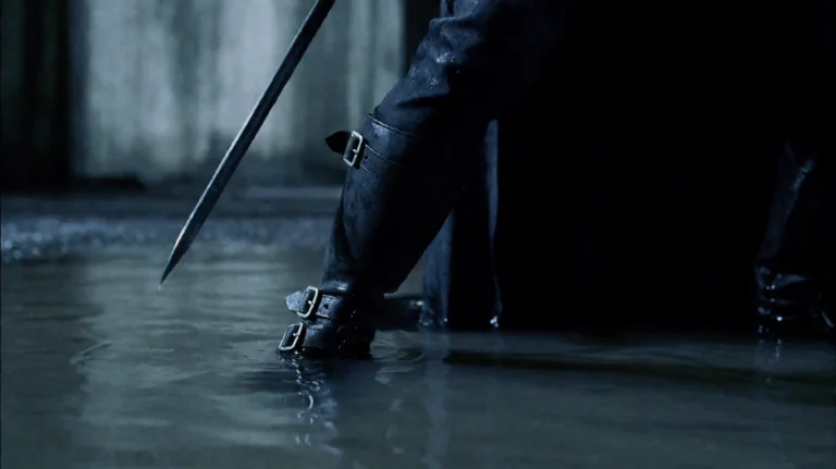 Undrwrld2003, A Figure Clad In Dark, Wet Leather Boots With...