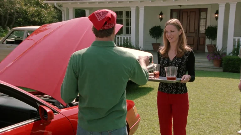 Oldschl2003, A Man In A Green Shirt And Red Bandana Stands W...