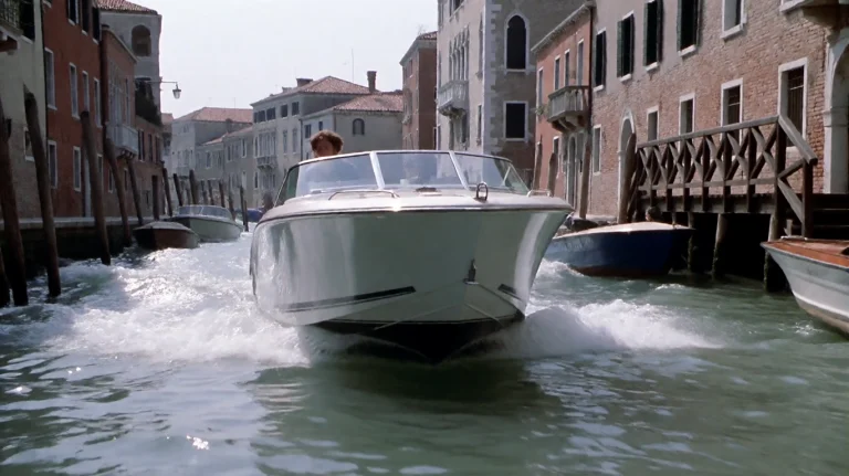 Itlnjb2003, A Sleek, White Motorboat Speeds Through A Narrow...