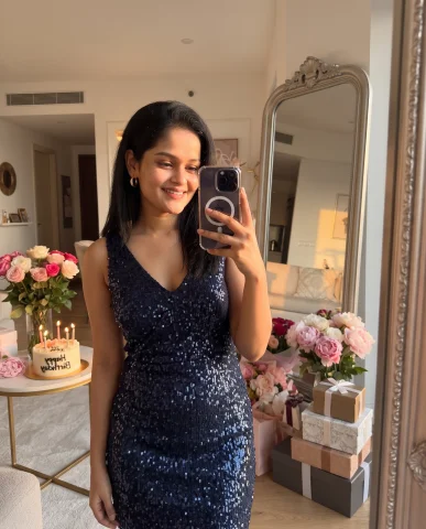 Trendy Birthday Mirror Selfie with Cake, Flowers and Gift Boxes — Nano Banana AI Prompt: A trendy birthday mirror selfie in a stylish apartment, a woman wearing a glamor...