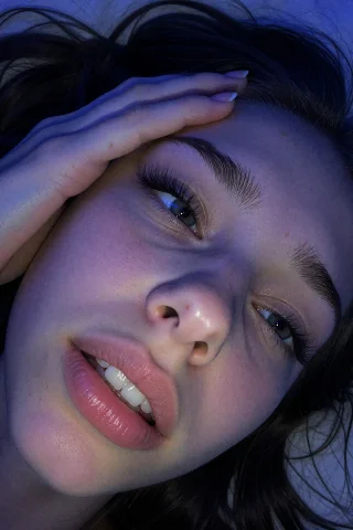 This Close-up Digital Photograph Shows A Single Individual,... — Stable Diffusion AI Prompt: This close-up digital photograph shows a single individual, a 19 year old woman,...