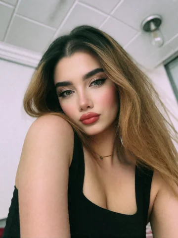 Young Woman With A Slightly Blurred, Vintage-style Effect. S... — Stable Diffusion AI Prompt: young woman with a slightly blurred, vintage-style effect. She has long, straigh...