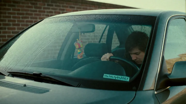 Mchlclytn2007, A Person Is Seated Inside A Car, Their Head B...