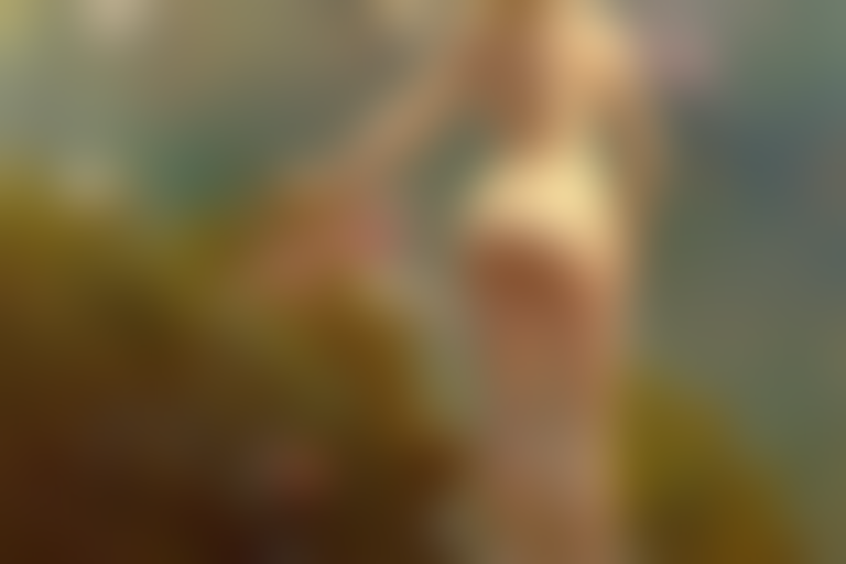 Back View Of A Woman Standing On A Rock Looking Down Into Th...